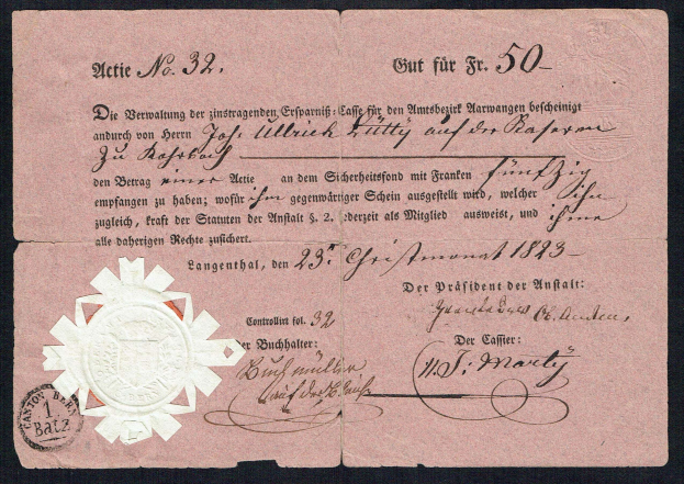 Ein altes deutsches Geldschein mit einem Siegel, das die Denomination anzeigt, vor einem schwarzen Hintergrund.