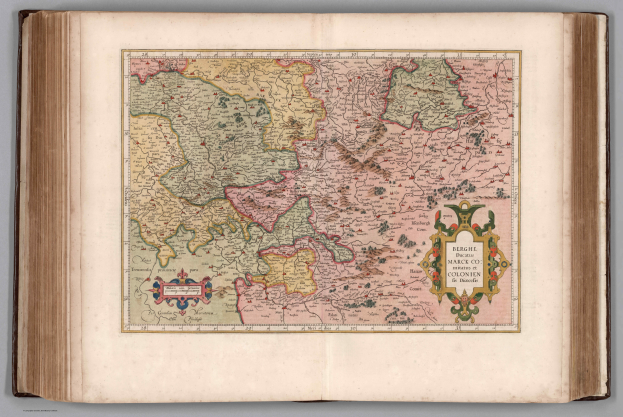 Ein aufgeschlagenes Buch mit einer detaillierten Karte von Deutschland und ihren verschiedenen Regionen, begleitet von beschreibendem Text.