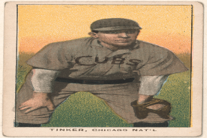 Ein Baseballkarte mit einem Mann in einer Mütze und einem Handschuh, mit dem Text "Tinker, Chicago Nat'l" unten.