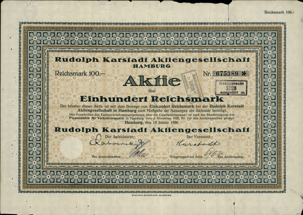 Ein altes deutsches Banknoten mit einem schwarzen Hintergrund und der Aufschrift "Rudolph Karlstadt Aktiengesellschaft Hamburg" darauf.