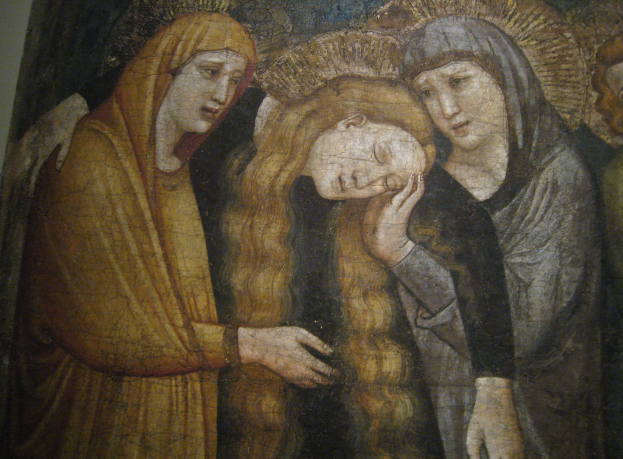 Ein abstraktes Gemälde mit verschiedenen Formen und Farben.